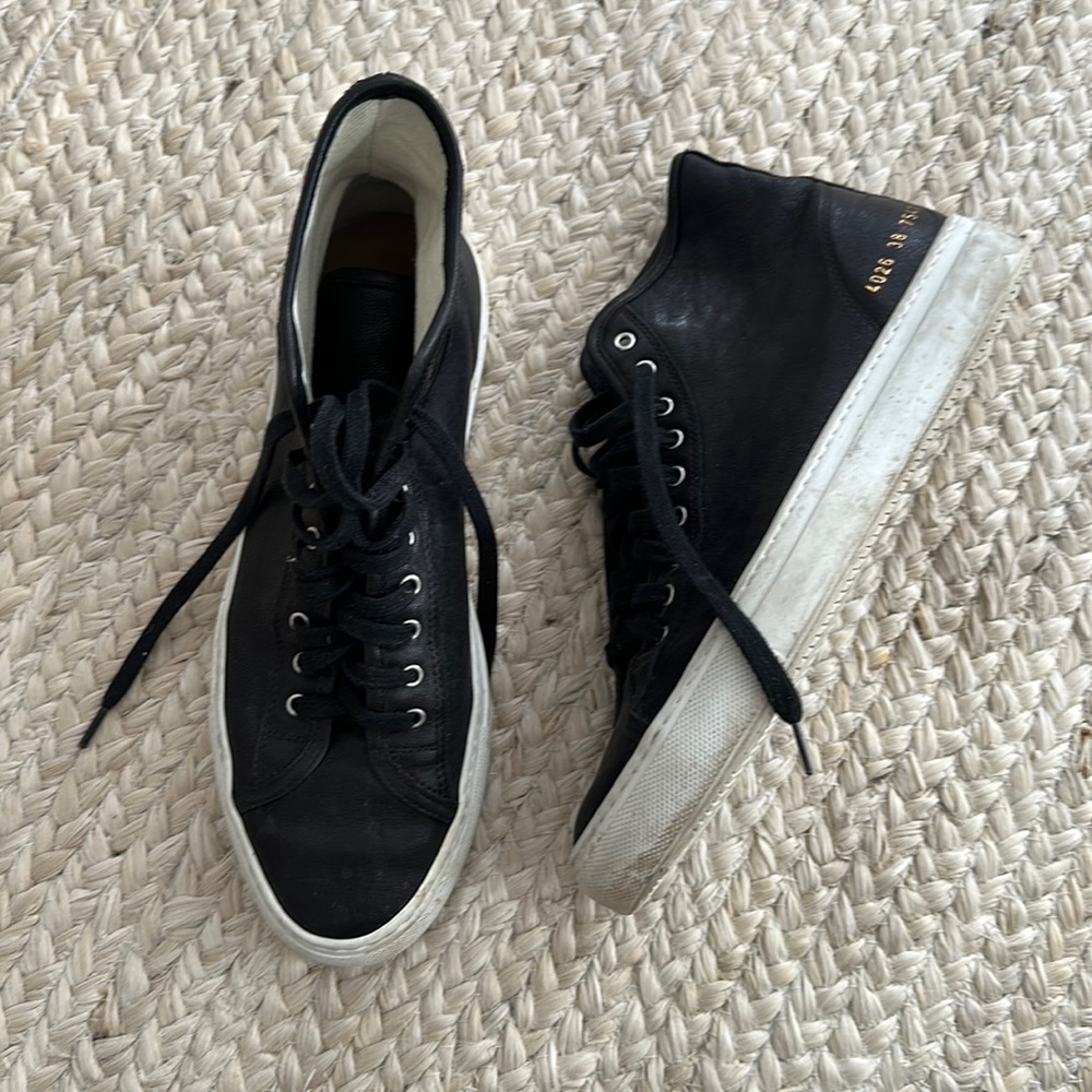 Common Projects black high top sneakers